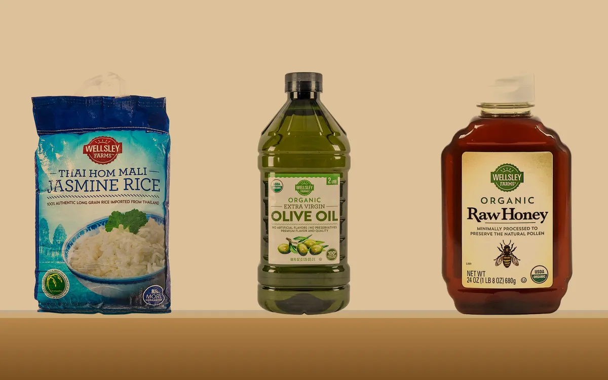 Wellsley Farms rice, olive oil and honey standing on a pantry shelf