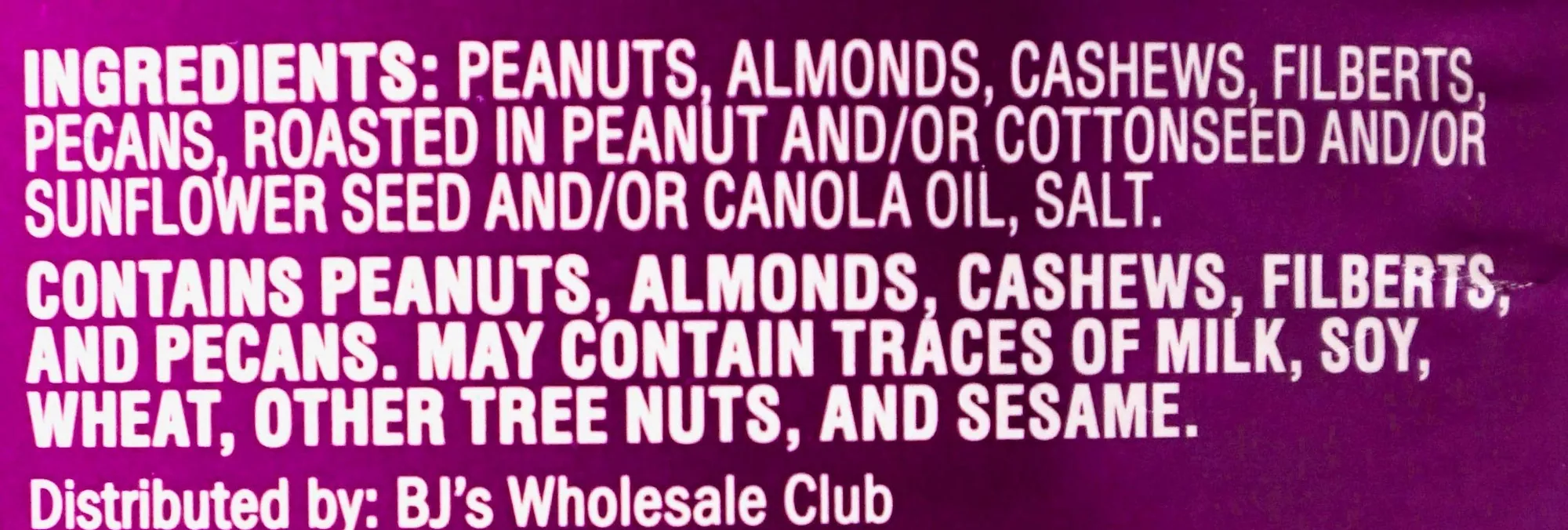 Back label of a Wellsley Farms mixed nuts jar with the distributor line